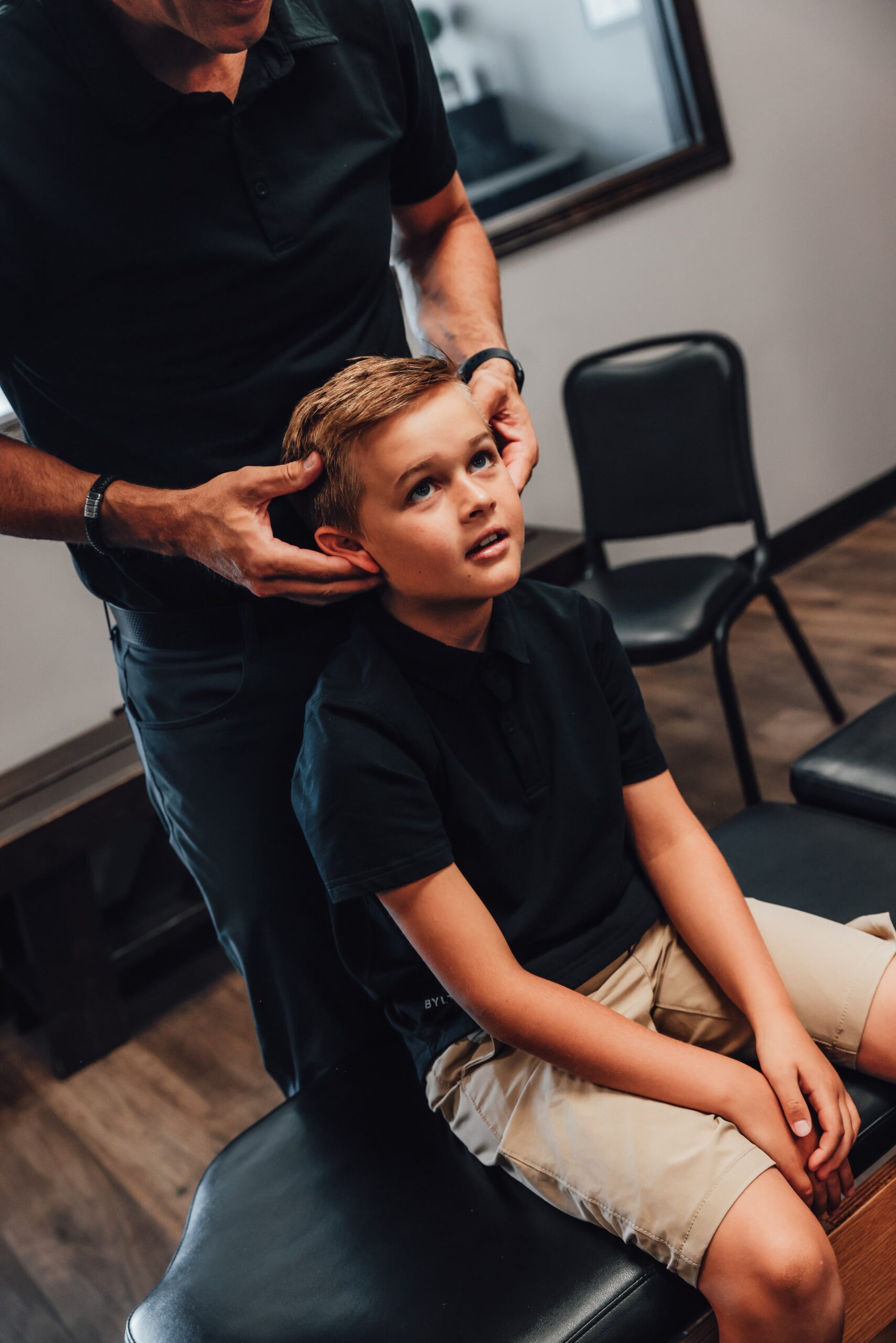 A family visiting Howell Chiropractic